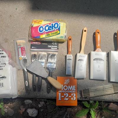Brand new paint brushes and some other painting supplies
