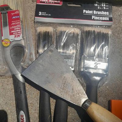Brand new paint brushes and some other painting supplies