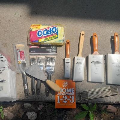 Brand new paint brushes and some other painting supplies