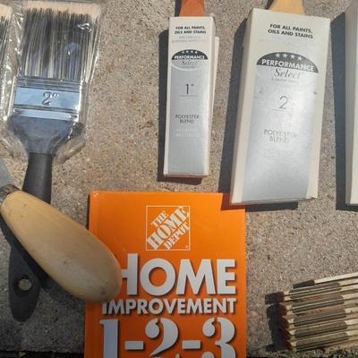 Brand new paint brushes and some other painting supplies