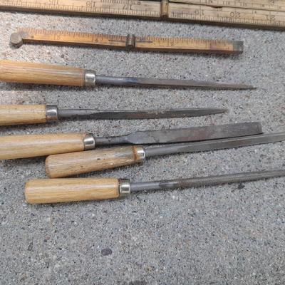 Grouping of wooden handled wood working tools - files - antique folding rulers and more