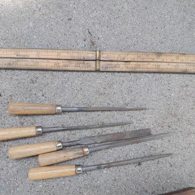 Grouping of wooden handled wood working tools - files - antique folding rulers and more