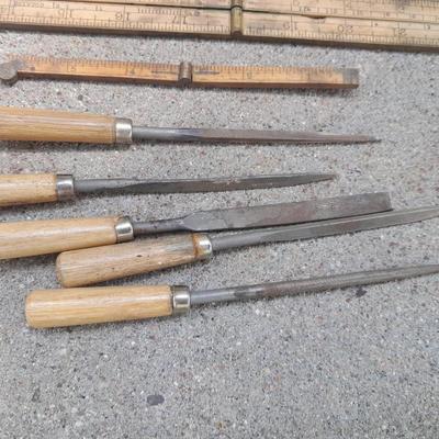 Grouping of wooden handled wood working tools - files - antique folding rulers and more