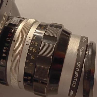 vintage Nikon 35mm camera with a BUNCH of accessories and carry case