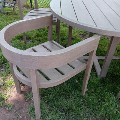 48" round Port side patio table with four captain's chairs