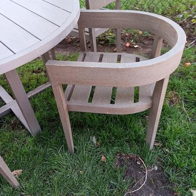 48" round Port side patio table with four captain's chairs