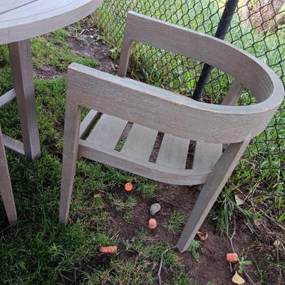 48" round Port side patio table with four captain's chairs