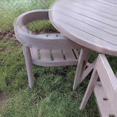 48" round Port side patio table with four captain's chairs