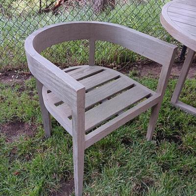 48" round Port side patio table with four captain's chairs