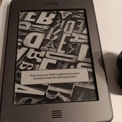 Working Amazon Kindle with genuine leather pouch made in Uruguay