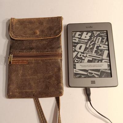 Working Amazon Kindle with genuine leather pouch made in Uruguay