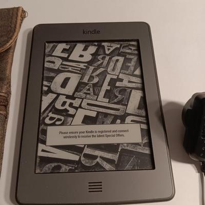 Working Amazon Kindle with genuine leather pouch made in Uruguay