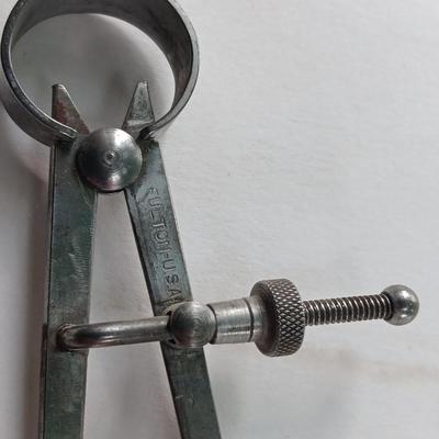 Antique calipers and small tape measure