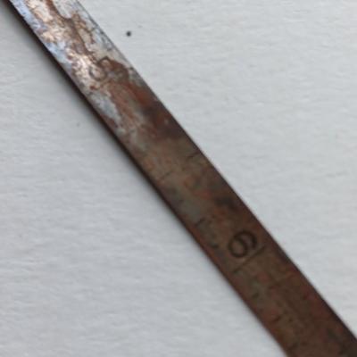 Antique calipers and small tape measure