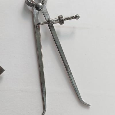 Antique calipers and small tape measure