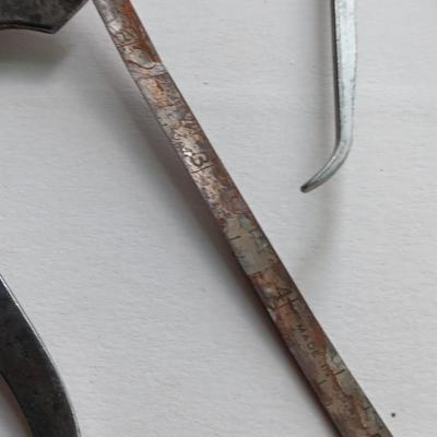 Antique calipers and small tape measure