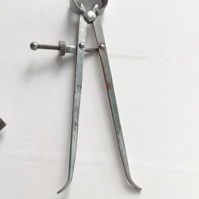 Antique calipers and small tape measure