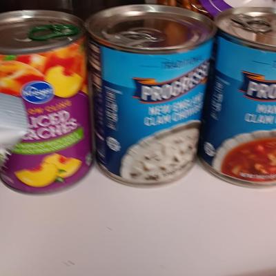 Large stainless-steel bowl full of groceries
