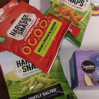 Large stainless-steel bowl full of groceries