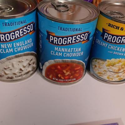 Large stainless-steel bowl full of groceries