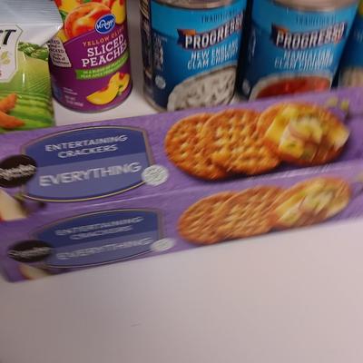 Large stainless-steel bowl full of groceries