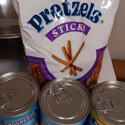 Large stainless-steel bowl full of groceries
