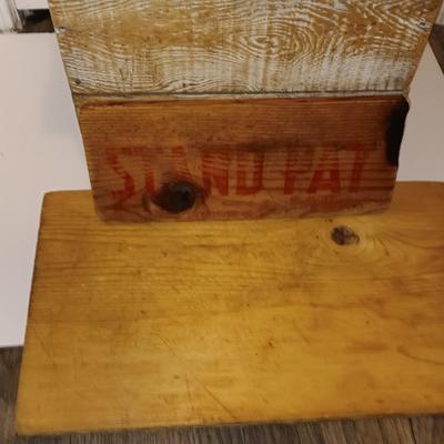Farmhouse style wooden box with lid and antique cutting boards