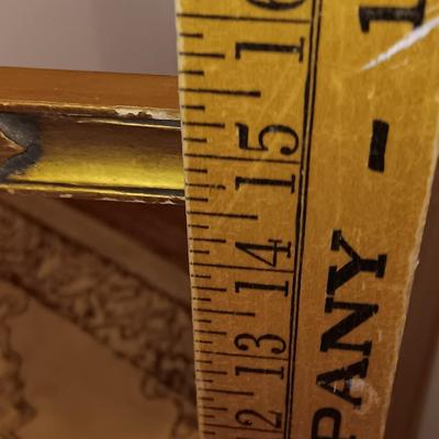 Antique gold framed mirror with a beautiful rubber backed throw rug