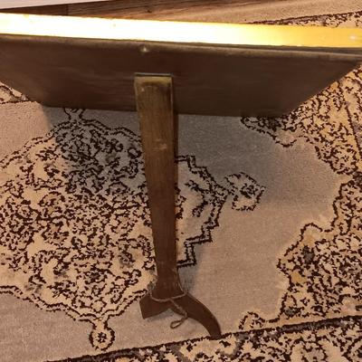 Antique gold framed mirror with a beautiful rubber backed throw rug