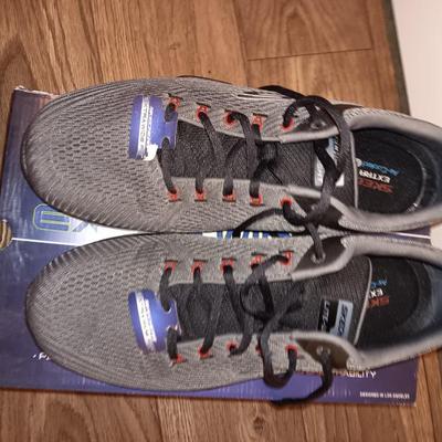 Brand new size 14 sketcher shoes and a pair of sketchers slippers