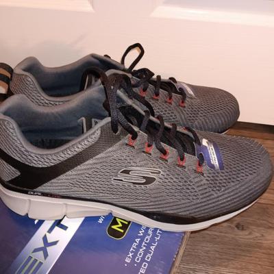 Brand new size 14 sketcher shoes and a pair of sketchers slippers