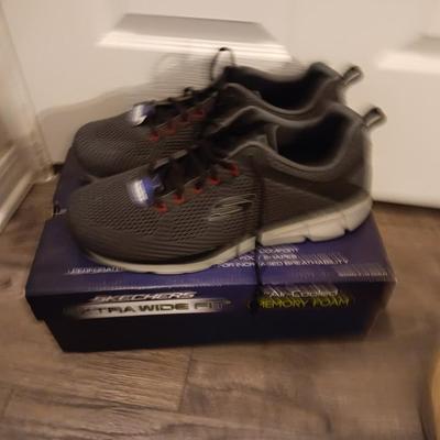Brand new size 14 sketcher shoes and a pair of sketchers slippers