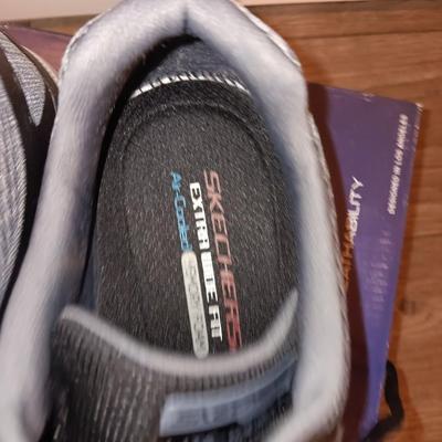 Brand new size 14 sketcher shoes and a pair of sketchers slippers