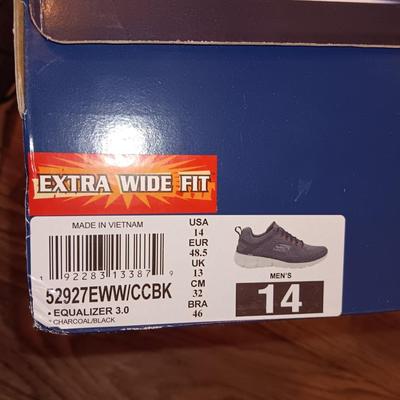 Brand new size 14 sketcher shoes and a pair of sketchers slippers