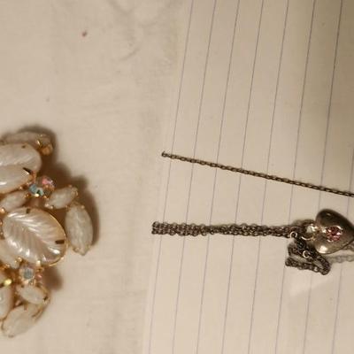 Jewelry lot including one carat emerald and vintage & clip earrings