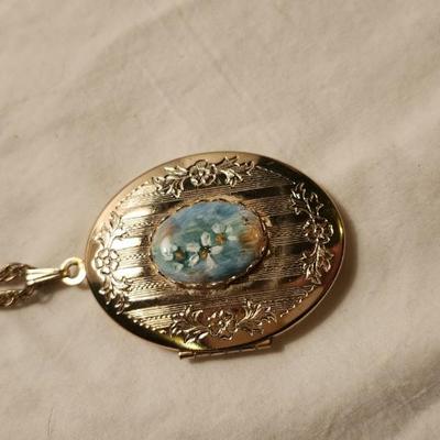 Jewelry lot including, turquoise Medallion , Vintage & clip earrings