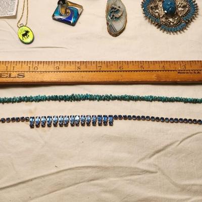 Jewelry lot including, turquoise Medallion , Vintage & clip earrings
