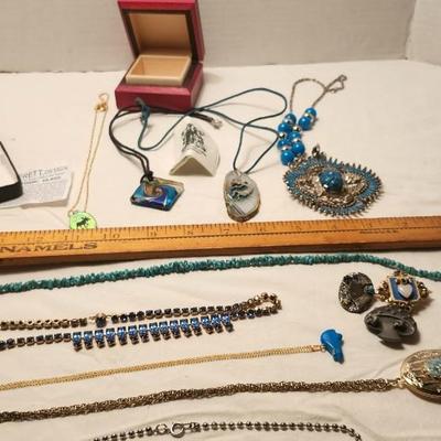 Jewelry lot including, turquoise Medallion , Vintage & clip earrings