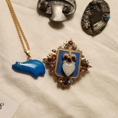 Jewelry lot including, turquoise Medallion , Vintage & clip earrings