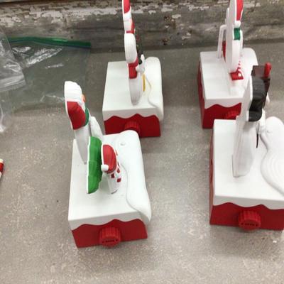 Hallmark Set Off Four Talking Snowmen,