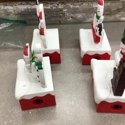 Hallmark Set Off Four Talking Snowmen,