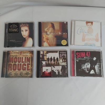Discman w/ CDs including Classic, Celtic, Christian and Country Music (DR-BBL)