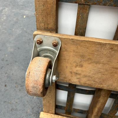 Vintage See-Saw Rolling Warehouse Cart Featuring Metal and Wood Construction