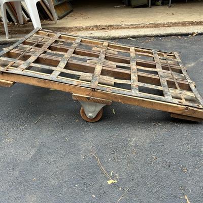 Vintage See-Saw Rolling Warehouse Cart Featuring Metal and Wood Construction