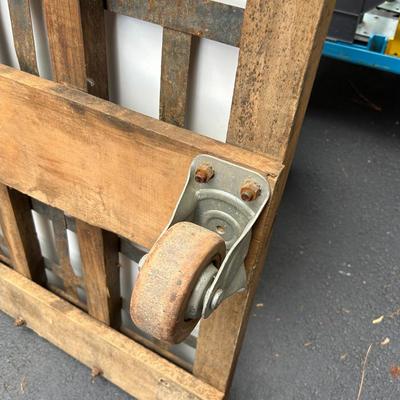 Vintage See-Saw Rolling Warehouse Cart Featuring Metal and Wood Construction