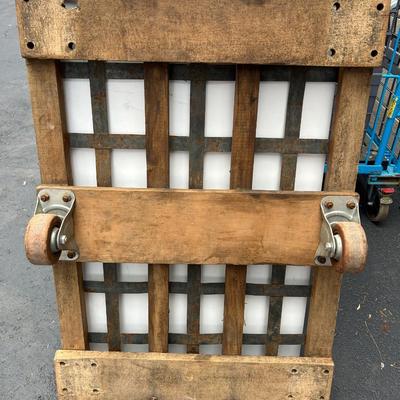 Vintage See-Saw Rolling Warehouse Cart Featuring Metal and Wood Construction