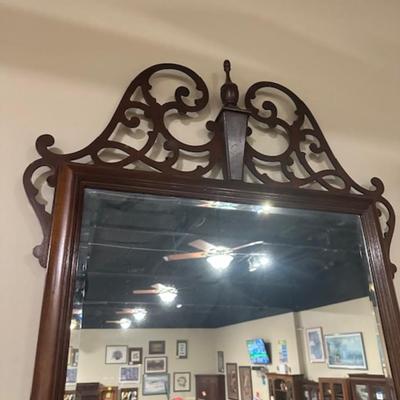 Beveled mirror with decorarative wood frame