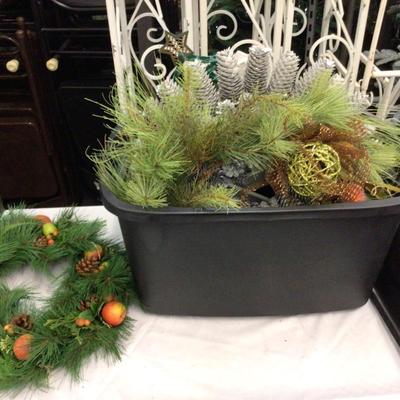 Tube of Holiday Wreaths and Lighted Christmas Tree