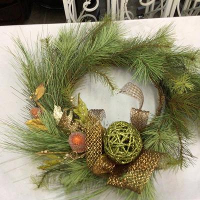 Tube of Holiday Wreaths and Lighted Christmas Tree