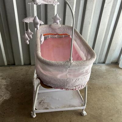 Delta Children Smart Sleep Auto Glide Pink & White Bassinet with Bluetooth